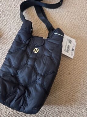 lululemon athletica Black Quilted Crossbody Bag with Gold Logo